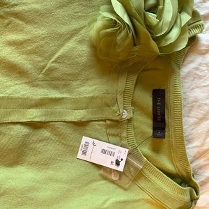 Green sweater with flower detail